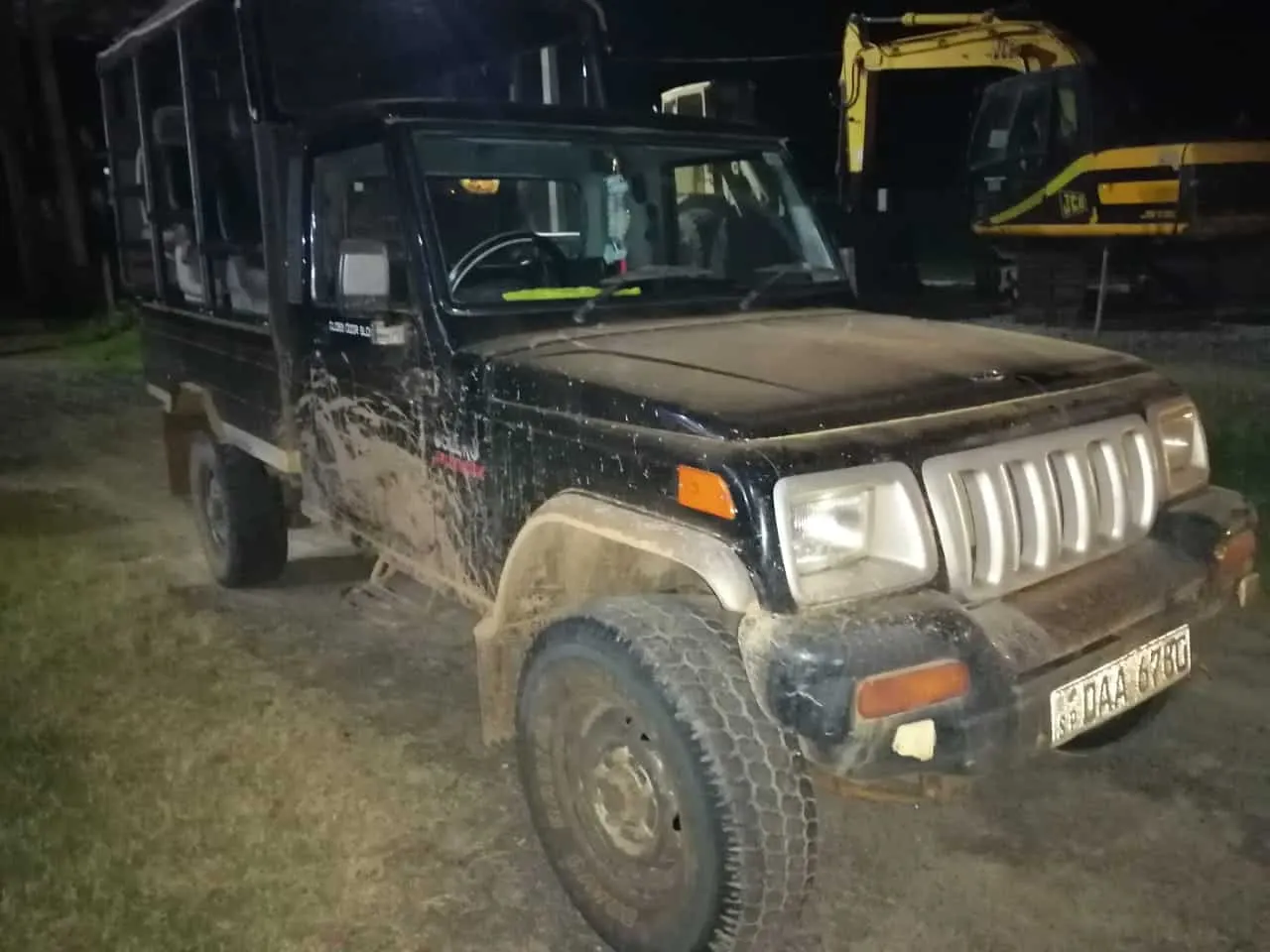 A safari jeep waiting in the dark for an early morning pickup