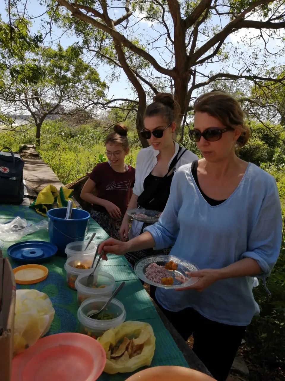 Sri Lankan rice and curry lunch laid out during a full day safari